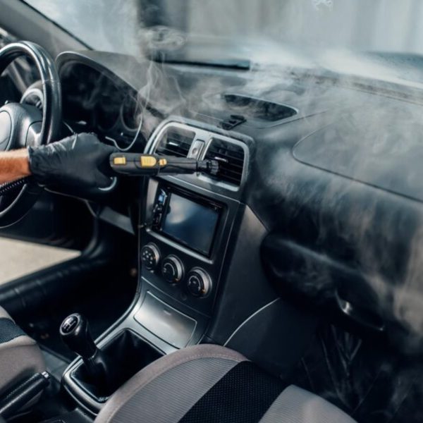 carwash-worker-cleans-salon-with-steam-cleaner-2023-11-27-05-33-45-utc carwash-worker-cleans-salon-with-steam-cleaner-2023-11-27-05-33-45-utc